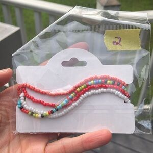 Set of 4 Stretchy anklets.  NWT.. handmade.